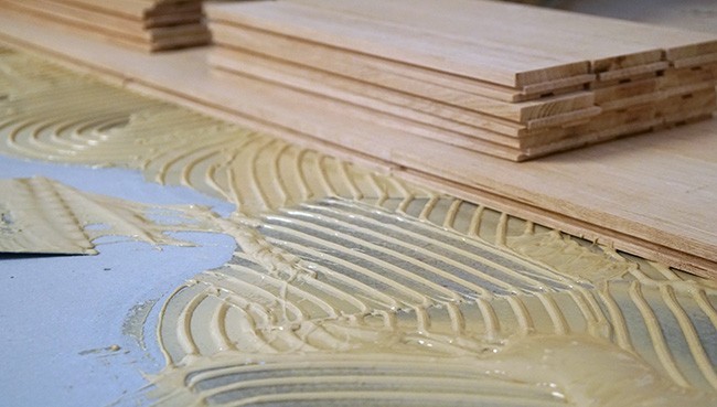 hardwood install glue | Key Carpet Corporation
